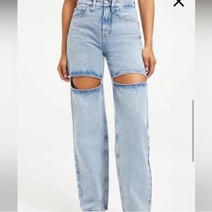 Good American 90s jeans with thigh slits. The jeans are actually black!
